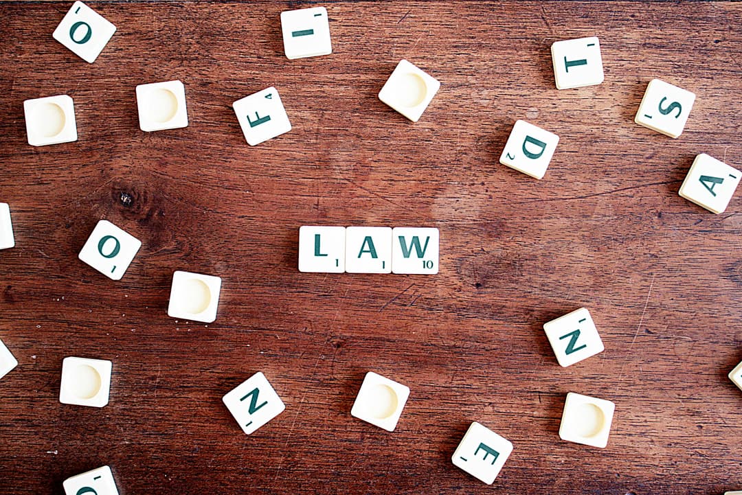Scrabble tiles spelling the word law